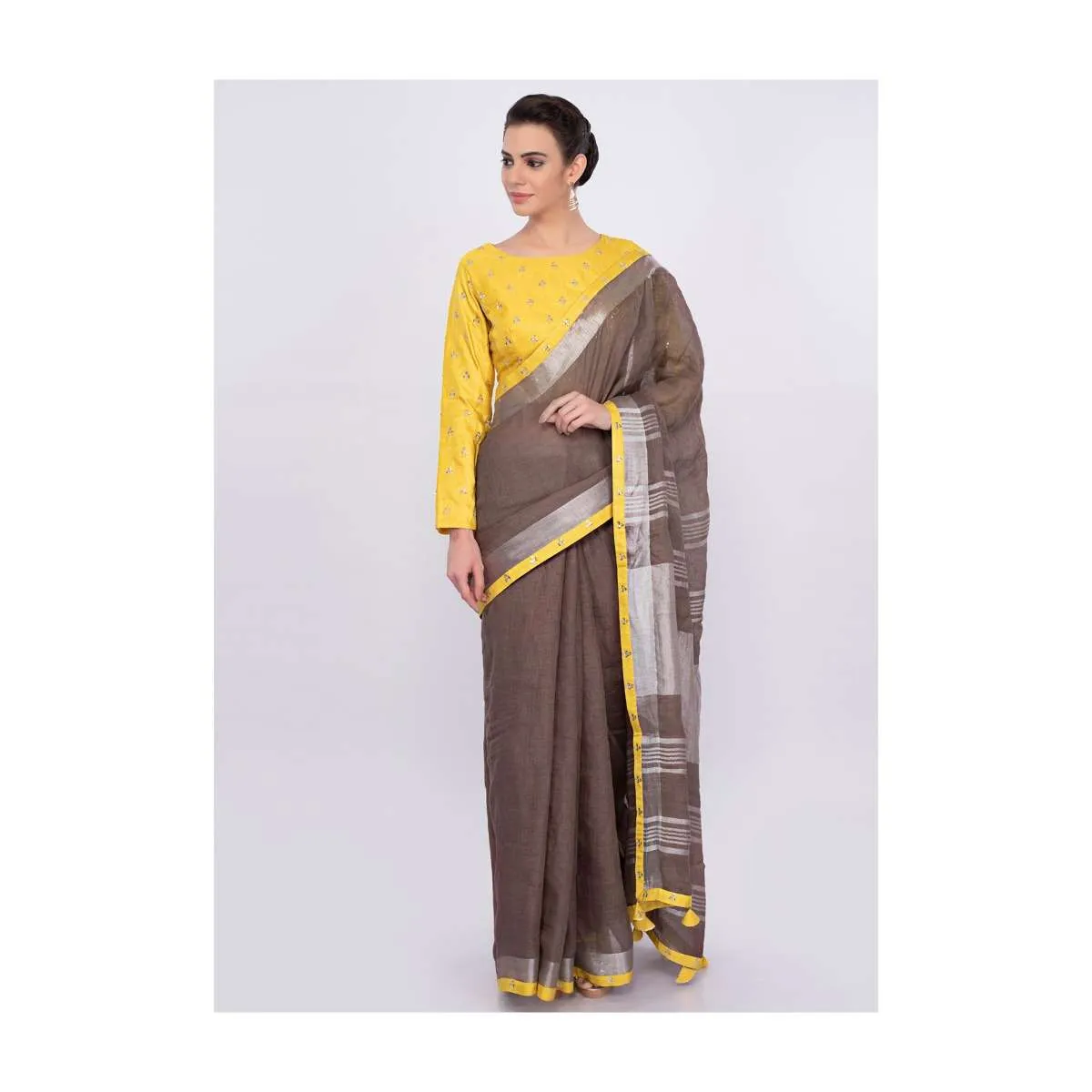 Pastel brown jute cotton saree with yellow border only on Kalki